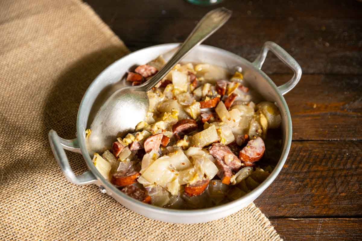 Savoureuse fondue d'endives à la saucisse fumée